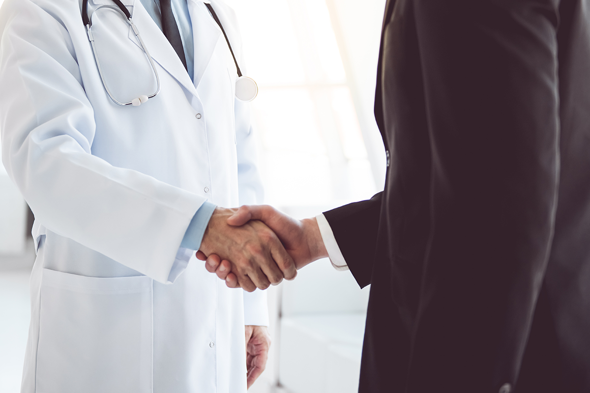 A surgeon and a business person