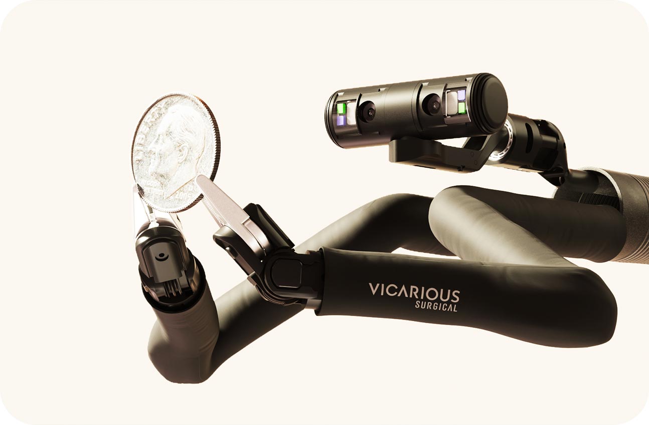 Vicarious Surgical robot holding a dime